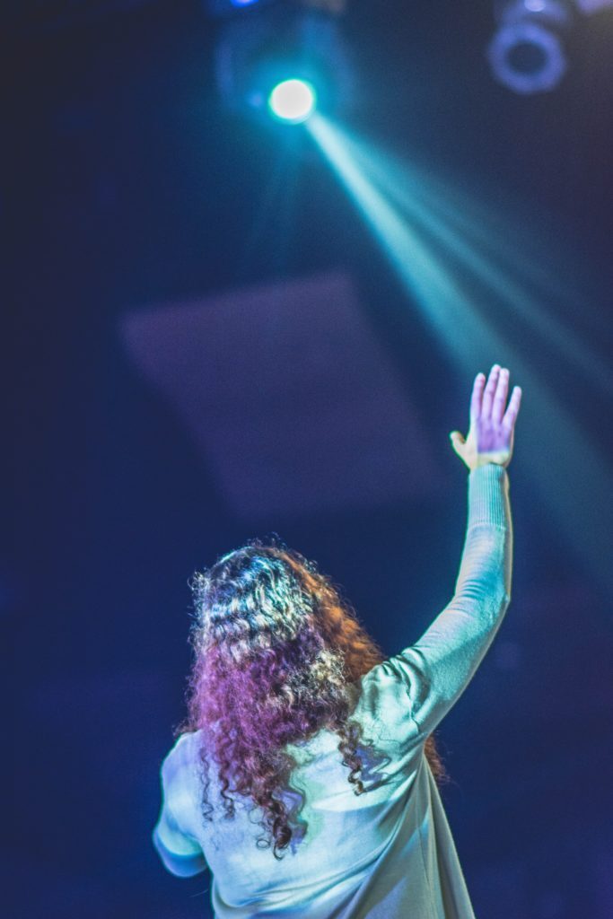 Raising hand on stage