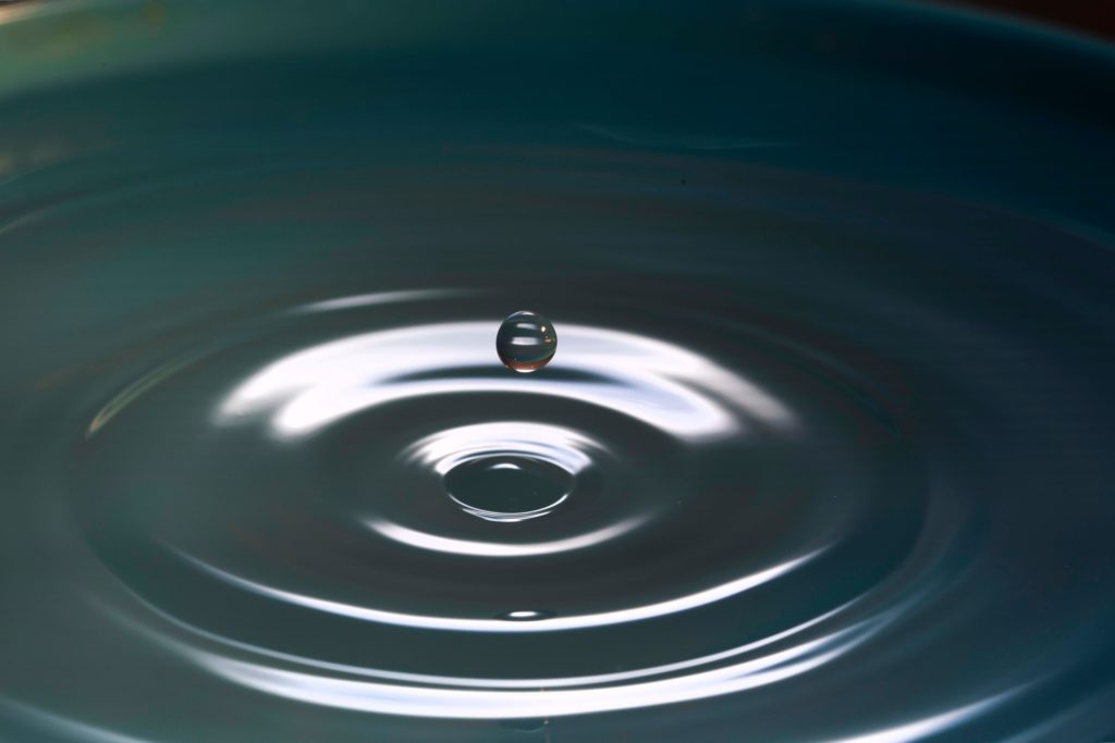 drop of water creating ripples